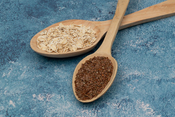 Seeds on a wooden spoon close up