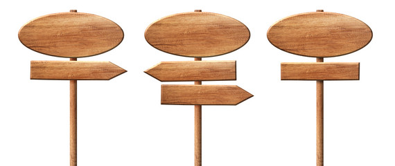 Different oval wooden direction arrow signposts or roadsigns made of natural wood
