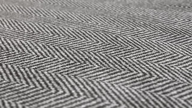 Herringbone background, macro shot of tweed fabric cloth 