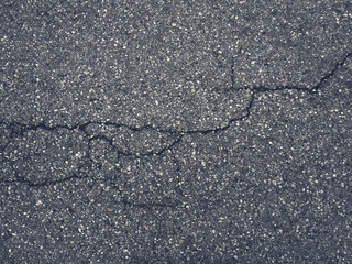 Obraz premium Risse im Asphalt