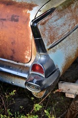 Close up of the tail wing of a 1957 Chevrolet Bel Air.