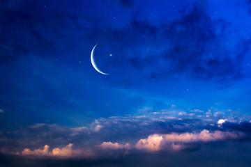 Obraz na płótnie Canvas Crescent moon with beautiful sunset background 