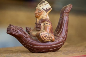 Handicraft from Peru: fisherman on a totora horse