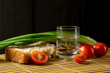vodka vegetables still life on the mat home russian style