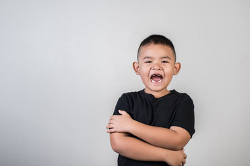 Portrait of boy thinking something in studio photo