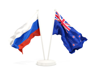 Two waving flags of Russia and new zealand isolated on white