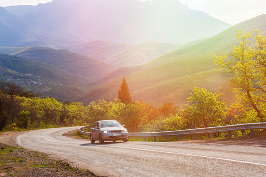 Car Moves On A Mountain Road