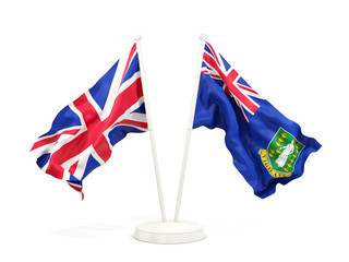 Fototapeta premium Two waving flags of UK and british virgin islands isolated on white