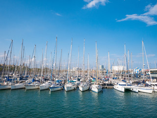 Fototapeta na wymiar Sailboat and sailing ship Port Vell in Barcelona, Spain