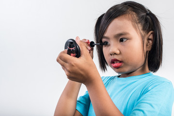 Fototapeta premium Portrait little girl makeup with her face