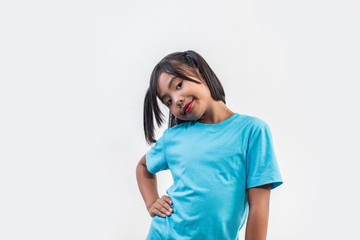 Portrait of Funny little girl acting in studio shot