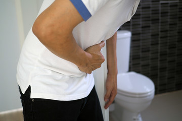 Men have abdominal pain. Want to shit. diarrhea concept