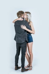 Portrait of happy young couple love together in studio