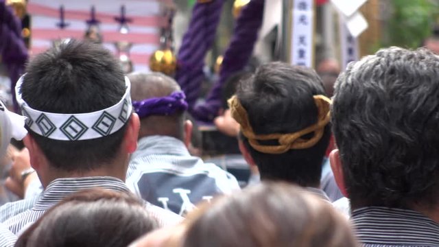 ASAKUSA, TOKYO,  JAPAN - 18 MAY 2019 : Scenery of SANJA FESTIVAL.  It is one of the three great shinto festivals in Tokyo.  Slow motion shot.