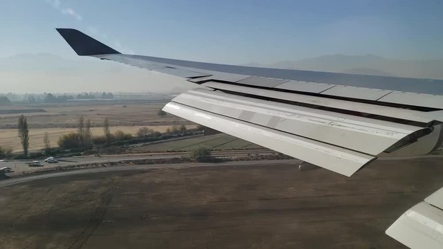 Plane landing at Santiago airport in Chile.