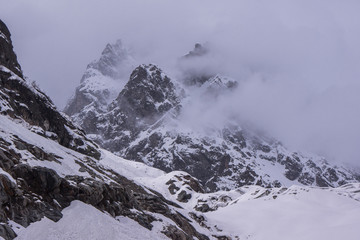 Obraz premium fog rising over mountain in Chalaadi Glacier