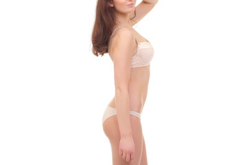 woman with a slim figure in white lingerie