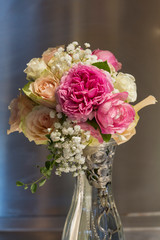 Pink, Yellow,orang roses with wild flowers in Glass Vase