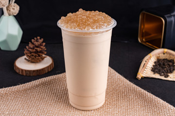 Fresh pressed frozen tea beverage in black background