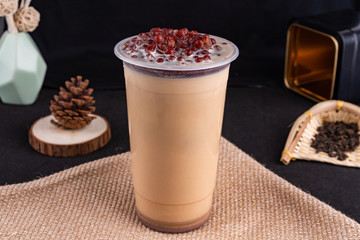 Fresh pressed frozen tea beverage in black background