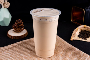 Fresh pressed frozen tea beverage in black background