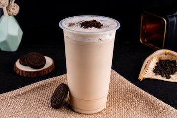 Fresh pressed frozen tea beverage in black background