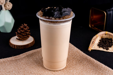Fresh pressed frozen tea beverage in black background