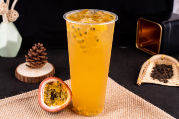 Fresh pressed frozen tea beverage in black background
