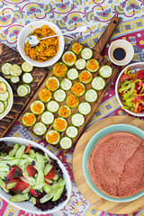 Baked roasted zucchini circles on board with carrot stuffing. Vegan lunch, vegetarian dinner, healthy food.