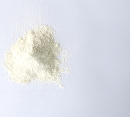 Fototapeta na wymiar Opaque white powder put on white paper