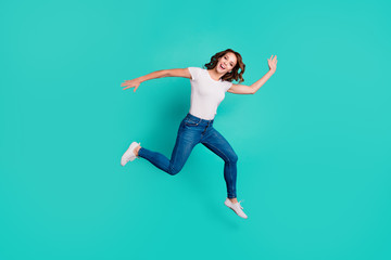 Full length body size view of her she nice attractive lovely crazy careless carefree cheerful slim fit thin slender wavy-haired lady having fun holiday isolated on bright vivid shine blue background