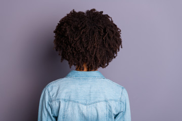 Close up back rear behind view photo of cool smart successful millennial stand behind show shoulders feel glad content relaxed dressed denim fashionable clothes isolated grey background