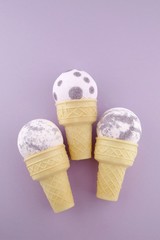 bath bomb . Purple bath bombs  with lavender extract in waffle cones on a  soft pastel purple...