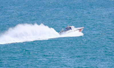 Fototapeta premium Coast Guard patrol boat rushing to the rescue M