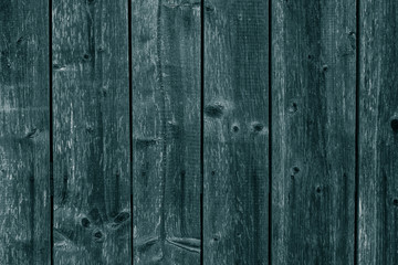 Naklejka premium Dark blue and green wooden boards, planks. Surface of old gray shabby weathered wood parquet, desk. Vintage pattern of rustic dark grey oak. Green woody grunge texture, barn. Old dirty grain timber. C