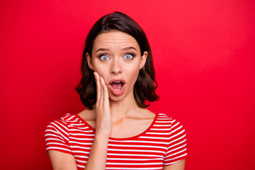 Fototapeta premium Portrait of astonished impressed lady scream shout horrified terrible news novelty touch cheeks hand palm yell gossip rumor secret privacy wear modern youth clothes isolated bright background