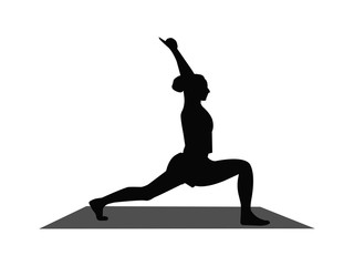 silhouette of woman practicing yoga