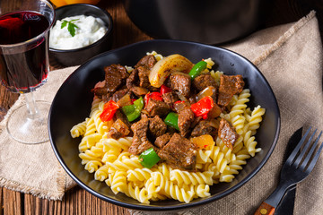 Fussili noodle with klaschise spicy goulash and paprika