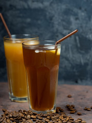 Two drinks of cold coffee . Homemade Coffee with cream and crushed ice