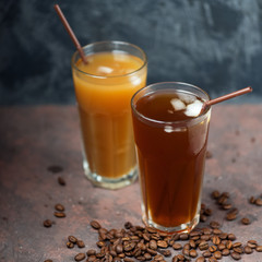 Two drinks of cold coffee . Homemade Coffee with cream and crushed ice