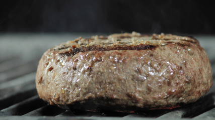 Natural veal burger cutlet cooked on the grill