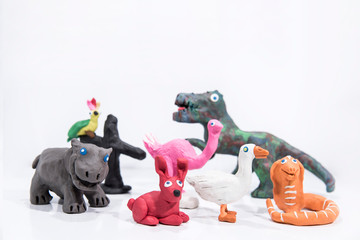 Plasticine artwork. Handmade camel. Abstract isolated photo.