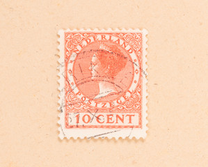 THE NETHERLANDS 1950: A stamp printed in the Netherlands shows the queen, circa 1950