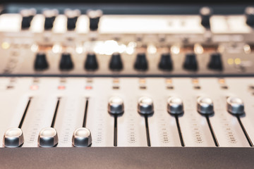 digital audio mixing console fader. recording, broadcasting, editing, post production concept