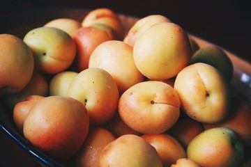Close up ripe apricots bowl 