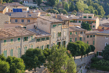Fototapeta premium View to stone streets of Valldemossa city, sunset, Balearic islands, Mallorca, Spain