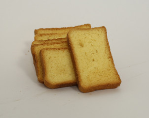 slices of bread on a plate rusk