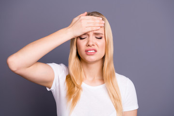 Close up photo beautiful amazing her she lady suffering facial expression eyes closed hold hands arms forehead terrible pain temperature wear casual white t-shirt isolated dark grey background