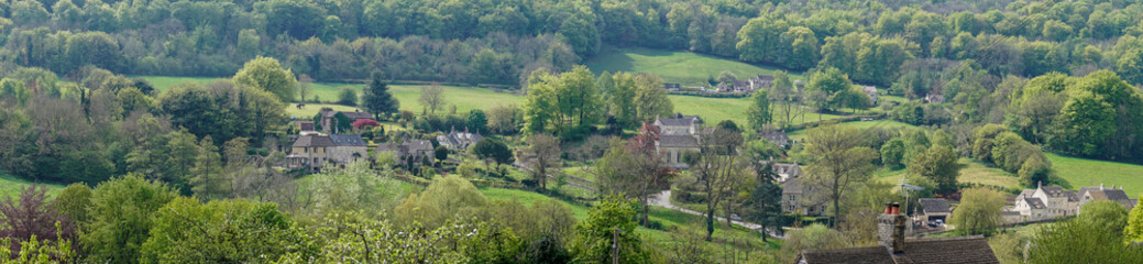 Naklejka premium View across Sheepscombe with village church, St John the Apostle, The Cotswolds,United Kingdom