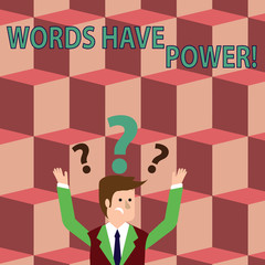 Writing note showing Words Have Power. Business concept for as they has ability to help heal hurt or harm someone Businessman Raising Both Arms with Question Marks Above Head